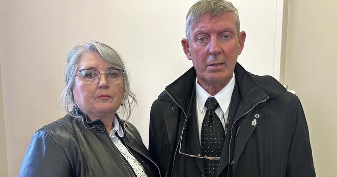 Cynthia Power and George Power of the Portugal Cove South Historical Corporation stand in a provincial Supreme Court room in St. John's, Tuesday, May 6, 2025. They're fighting a court application asking them to hand over a church in their community so it can be sold to compensate survivors of historical sexual abuse. THE CANADIAN PRESS/Sarah Smellie