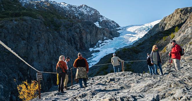 The Exit Glacier overlook in the Kenai Fjords National Park, Alaska. The sign at left marks the extent of the ice in 2010.