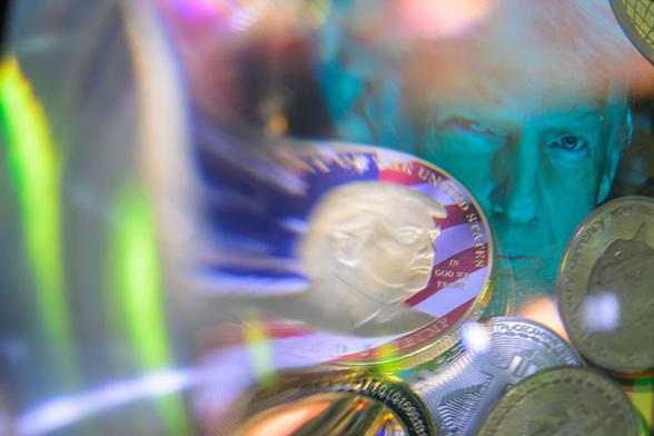 This photo illustration shows a representation of cryptocracy coins with the $Trump memecoin in Brussels, Belgium, on March 3, 2025.