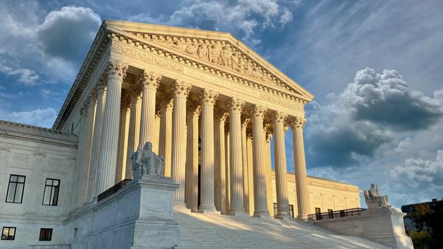 The United States Supreme Court building seen during daytime.