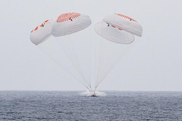 The SpaceX Crew Dragon Endurance spacecraft is seen as it lands with NASA astronauts Anne McClain and Nichole Ayers, JAXA (Japan Aerospace Exploration Agency) astronaut Takuya Onishi, and Roscosmos cosmonaut Kirill Peskov aboard in the Pacific Ocean off the coast of San Diego, Saturday, Aug. 9, 2025.