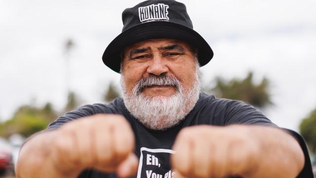 John Kaʻohelauliʻi teaches both his fellow native Hawaiians and visitors alike about Kōnane.