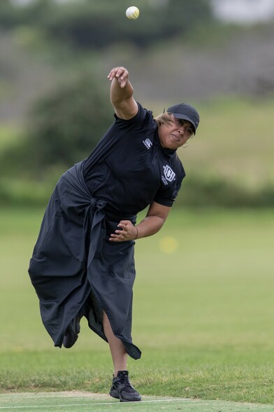 A kilikiti bowler releases her delivery.