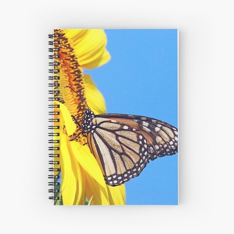 Monarch Butterfly and yellow sunflower with blue sky spiral  notebook