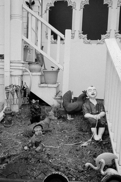 Yard ornaments welcome visitors to a home.