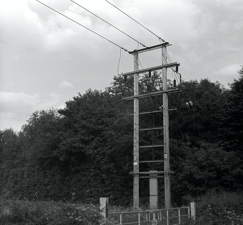 A 6x6 medium format black and white film photo of my favourite power lines pylon near my home. I re scanned it with my newly acquired Valoi medium format film holder and Pixl-Latr that I already had.