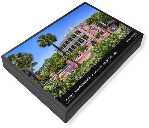 Jigsaw Puzzle: Charleston SC mansion, the Palmer Home, on a bright sunny day showing stately palm trees around the pink mansion with stunning white columns. From the Fine Art Gallery of Shelia Hunt.