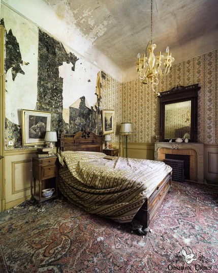 old bedroom with chandelier