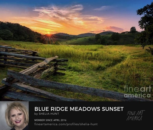 "Blue Ridge Meadows Sunset" beautifully captures the serene expanse of a grassy meadow with a weathered split-rail fence, nestled in the Blue Ridge Mountains of North Carolina at sunset. The sun, on the verge of dipping below the horizon, bathes the landscape in a breathtaking display of colors—warm hues of orange and pink melding with the deepening blue of the sky.  From the Fine Art Gallery of Shelia Hunt at Shelia-Hunt.pixels.com