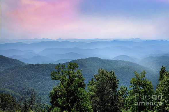 "Best of the Blue Ridge Mountains" captures a breathtaking view of the top of the Blue Ridge mountain ranges, with a soft pink cloud drifting across the sky and a blue haze settling in the valley below at dusk.   From the Fine Art Gallery of Shelia Hunt at Shelia-Hunt.pixels.com