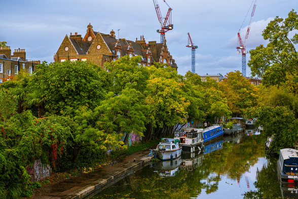 Canal boats and surrounding trees reflecting in Regent's Canal in early autumn evening viewed from Regents Park Road bridge
Captured by Komeil Karimi