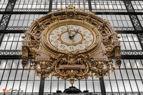 A huge golden clock displayed in Paris' Musee d'Orsay.