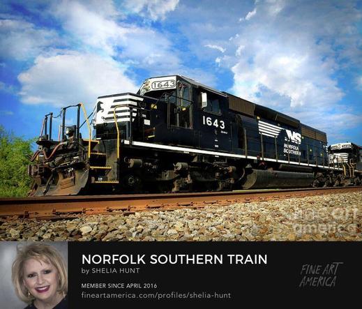 Norfolk Southern Train rolling through Newport, Tennessee on a bright summer day, with beautiful bright blue sky and white clouds overhead.   From the Fine Art Gallery of Shelia Hunt at Shelia-hunt.pixels.com
