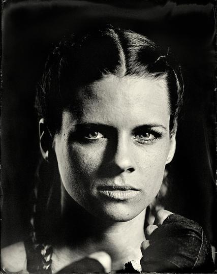 Wetplate collodion portrait of a young female kickboxer with two side braids