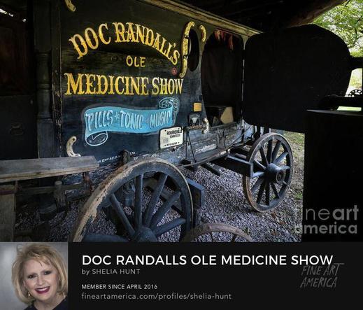 Beautiful black carriage on display at Museum of Appalachia in Norris, Tennessee. Carriage has blue lettering for “Doc Randall’s Ole Medicine Show”... The picture of this vintage, antique, retro carriage is from the Fine Art Gallery of Shelia Hunt.