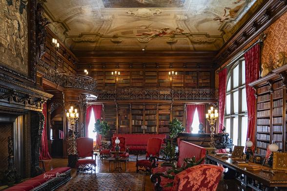 The Library Biltmore Estate Asheville North Carolina

This is the Library in the Biltmore Estate in Asheville, North Carolina, one of the most awe-inspiring rooms in the mansion. A testament to George Washington Vanderbilt II’s love for literature, this grand space houses over 10,000 books from his personal collection, many of which date back to the 15th century.

The two-story library is framed by richly carved wood paneling and features an ornate wrought-iron balcony, accessible by a hidden spiral staircase. The ceiling mural, painted by Giovanni Battista Tiepolo, was originally from a Venetian palace and depicts an allegorical scene of the arts and sciences, adding to the room's European elegance.

A massive fireplace, intricate gilded lamps, plush red velvet draperies, and elegant furniture enhance the room’s opulence, making it a warm and inviting space for reading and conversation. Large arched windows flood the space with natural light, highlighting the craftsmanship of the Renaissance-style décor.

Image:
https://fineartamerica.com/featured/the-library-biltmore-estate-asheville-north-carolina-wayne-moran.html

Read more:
https://waynemoranphotography.com/blog/exploring-the-biltmore-estate-ashville-north-carolina/

#Library #Books #knowledge #widsom #Gallery #biltmore #historic #architecture #art #biltmoreestate #vanderbilt #ashville #northcarolina
#mountain #landscape 