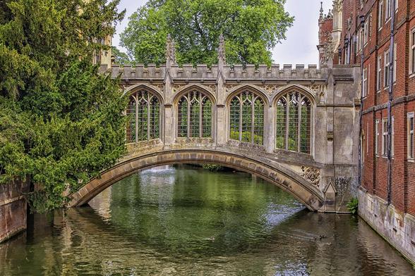 The famous bridge of sighs of st Johns college at Cambridge university in Cambridge, England.

The Bridge of Sighs is an iconic feature of St John’s College, and one of the most recognisable pieces of architecture in Cambridge.

Built nearly 200 years ago, it is the only covered bridge to cross the River Cam, and the only College bridge built in the Victorian Gothic style.

Since its construction in 1831 it has featured in thousands of photographs and artistic projects, as well as appearing in films including.

The bridge connecting New Court on the west bank with the seventeenth-century Third Court on the east bank was officially named ‘New Bridge’. However, it soon became known anecdotally as ‘the Bridge of Sighs’ – a reference to the famous enclosed bridge that connects the ducal palace to the prison in Venice, Italy.
