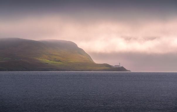"Lighthouse, Light Patches" photograph from Shetland, showing the Bressay Lighthouse under a dramatic sky.