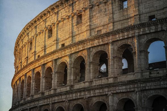 A portion of the outside of the Colosseum in rome Italy, at dawn, when the rising sun bathes the structure in a golden light. 

https://joan-carroll.pixels.com/featured/early-morning-at-the-colosseum-rome-italy-joan-carroll.html

 #colosseum #rome #italy #amphitheater #arches #ancient #historica #imperial #golden #sunlight #stonework #landmark #BuyIntoArt #AYearForArt #artforsale #wallartforsale #giftideas @joancarroll 