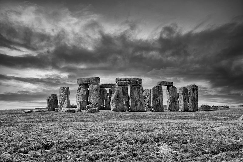 Stonehenge, England. UK in black and white

Stonehenge is probably the most important prehistoric monument in the
whole of Britain and has attracted visitors from earliest times. It stands as a timeless monument to the people who built it.