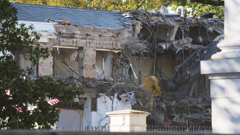 A photo of the demolition of the White House East Wing.