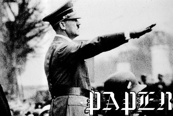 Hitler giving the Nazi salute. The word "PAPER" has been imposed, meme-style, in a blackletter font.