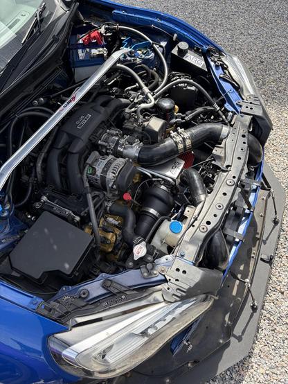 Under bonnet photo of a custom turbocharger installed on Subaru BRZ