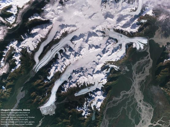 satellite image - Chugach Mountains, Alaska - Glaciers in the Chugach Mountains of Alaska. This image, captured by the Copernicus Sentinel-2 mission on 6 October 2017, shows the melting Scott (left), Sheridan (middle) and Childs (right) glaciers feeding lakes and rivers in their forefields.