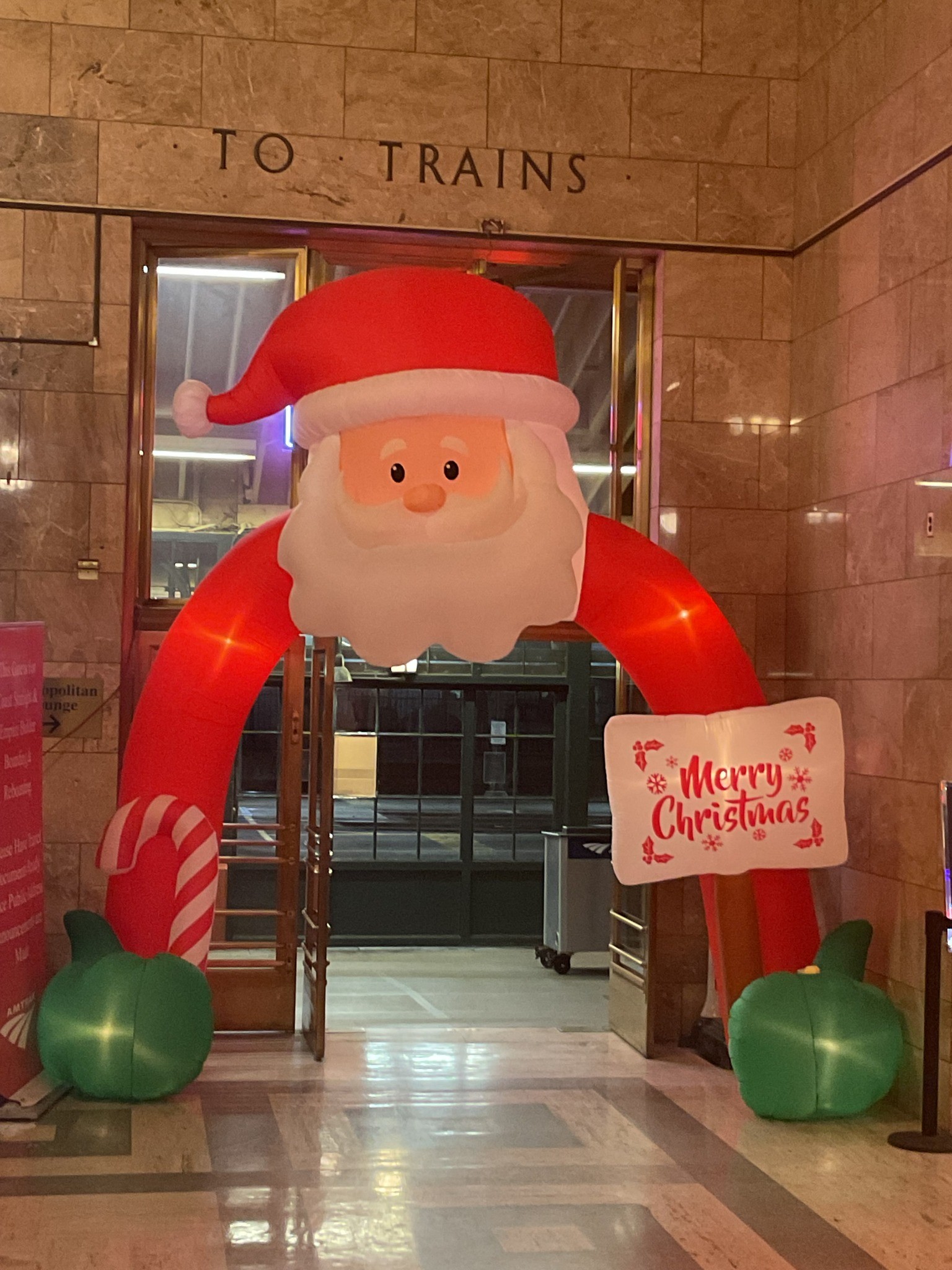 Santa at exit to trains, Portland (OR) Union Station.