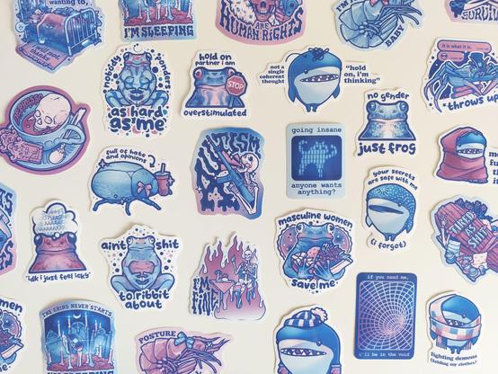photo of my many stickers with cute animals, skeletons and relatable quotes