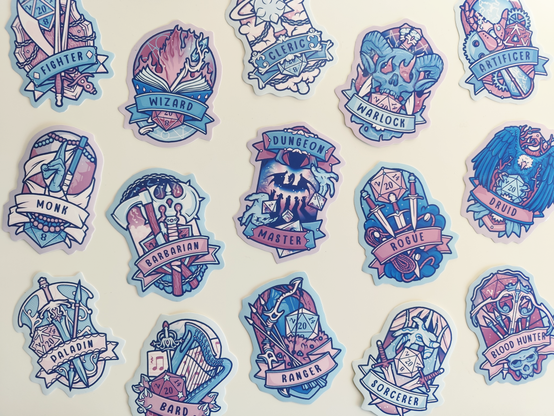 photo of my many DnD themed stickers showing basic classes