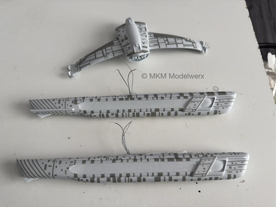 Model parts with grey vinyl masks applied