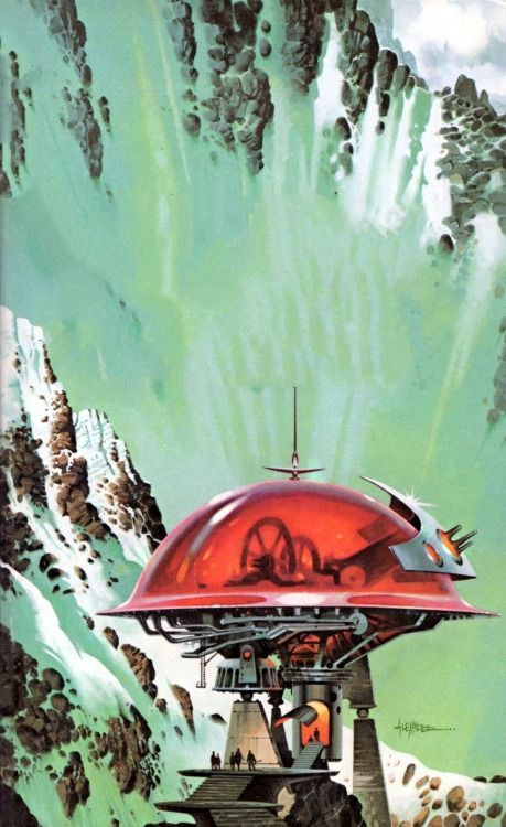 A red, dome-shaped structure with visible machinery inside perches on a platform built into the side of a steep, snow-capped mountain. Several figures stand on the platform, dwarfed by the futuristic machine. 