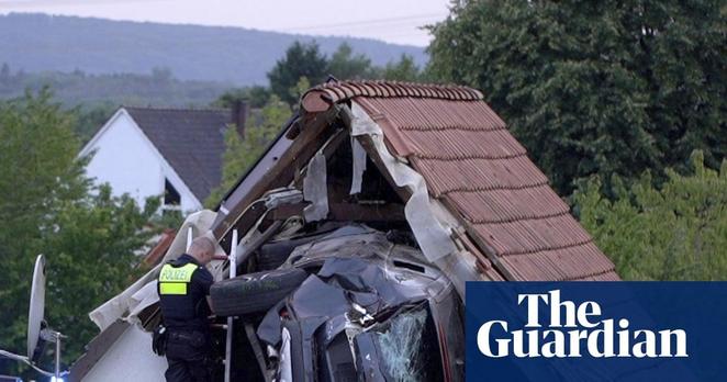 car stuck in house roof