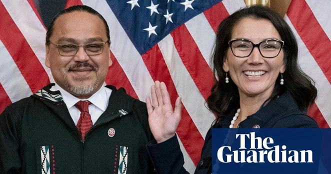 Eugene 'Buzzy' Peltola Jr holds the Bible during a ceremonial swearing-in for his wife, Alaska congresswoman Mary Peltola, on Capitol Hill in Washington DC on 13 September 2022. Photograph:

José Luis Magaña/AP