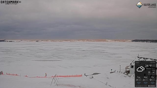Western view from Silver Lake township of Silver Lake and its dunes nestled next to Lake Michigan. // Image captured at: 2025-12-15 18:36:15 UTC (about 1 min. prior to this post) // Current Temp in Silver Lake: 22.09 F | -5.51 C // Precip: overcast clouds // Wind: WSW at 19.998 mph | 32.18 kph // Humidity: 81%