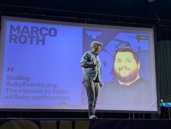 Jan announcing Marco's talk "Scaling RubyEvents.org: The mission to index all Ruby conferences"