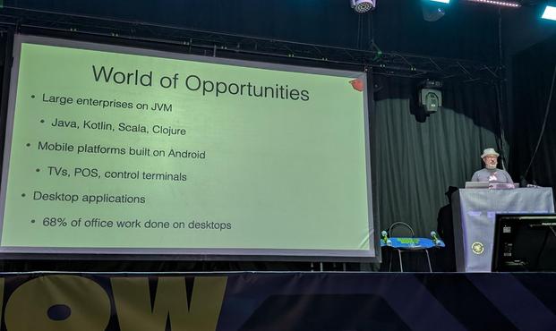 Charles Nutter presenting a slide with different use cases of JRuby