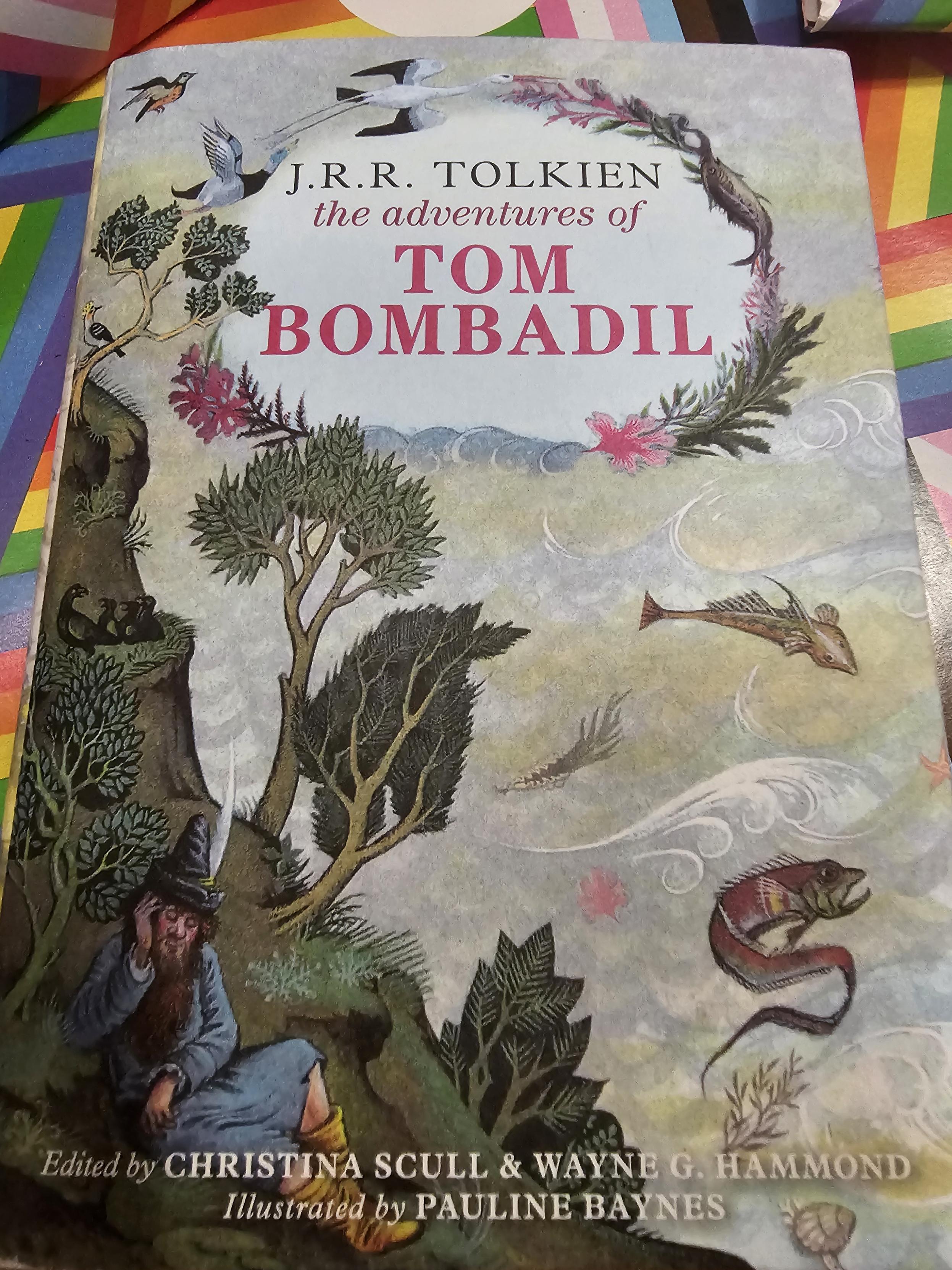 Book cover reading:
'J.R.R. TOLKIEN
the adventures of
TOM
BOMBADIL

Edited by CHRISTINA SCULL & WAYNE G. HAMMOND
Illustrated by PAULINE BAYNES'

Cover shows Tom Bombadil reclining on a river bank, with many birds and fish