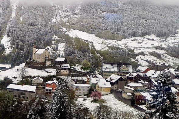 The picturesque church and village of Wassen, dusted in a fine coating of fresh snow