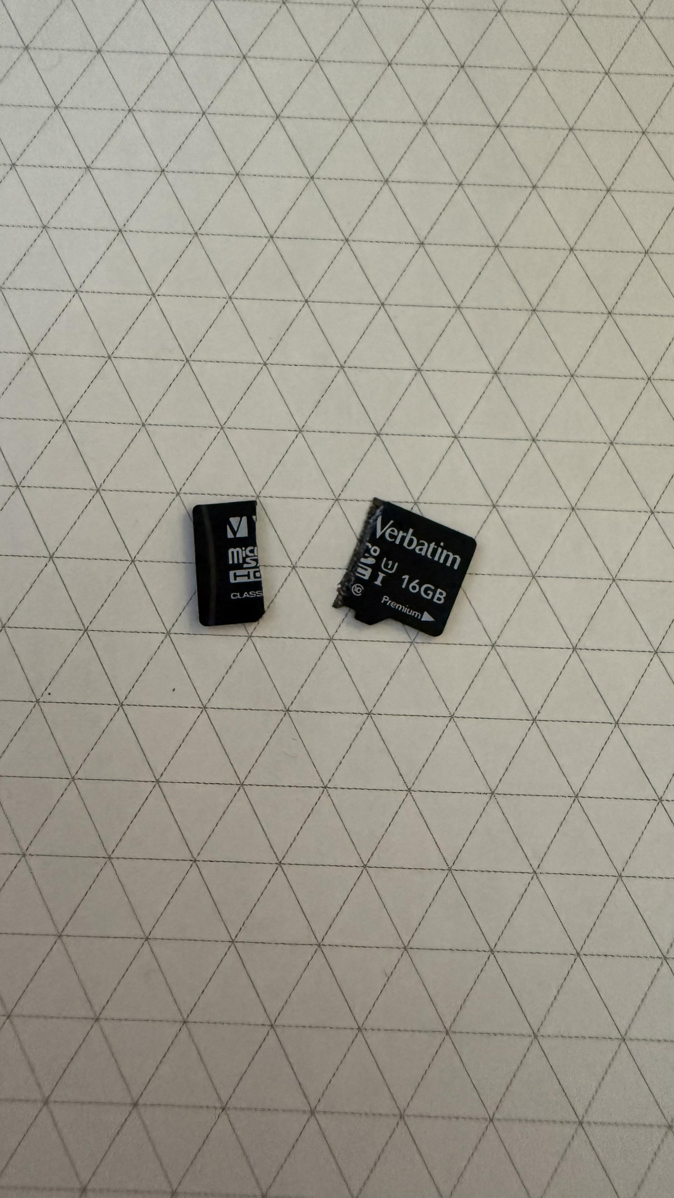 A MicroSSD broken in half, along the imaginary line where it sticks out from the RPi PCB.