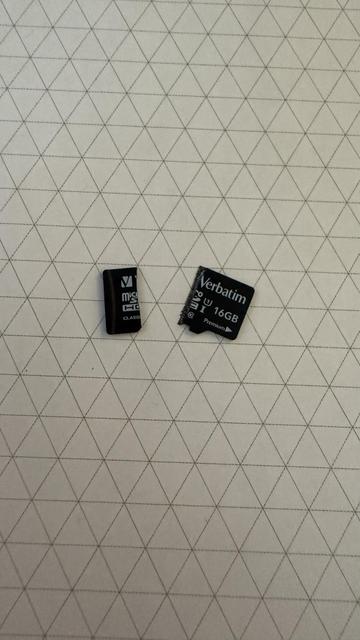 A MicroSSD broken in half, along the imaginary line where it sticks out from the RPi PCB.