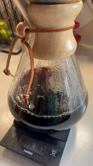 Chemex (manual drip coffee maker) finishing its thing.