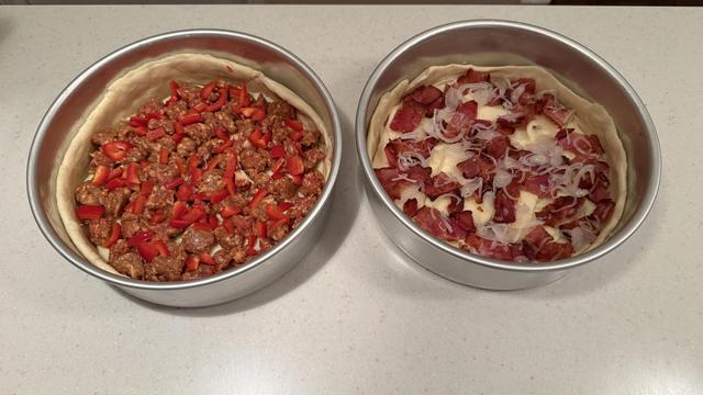 Pre-sauce panned pizzas