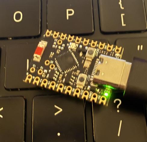 A “super mini” ESP32-C6 board. With my MacBook Pro keyboard for scale, it’s not much larger than the “L” key.
