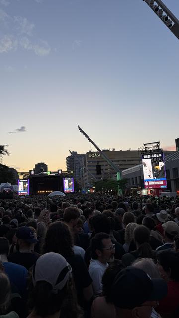 The scene at Place des Festivals before the show started, showing a huge crowd.