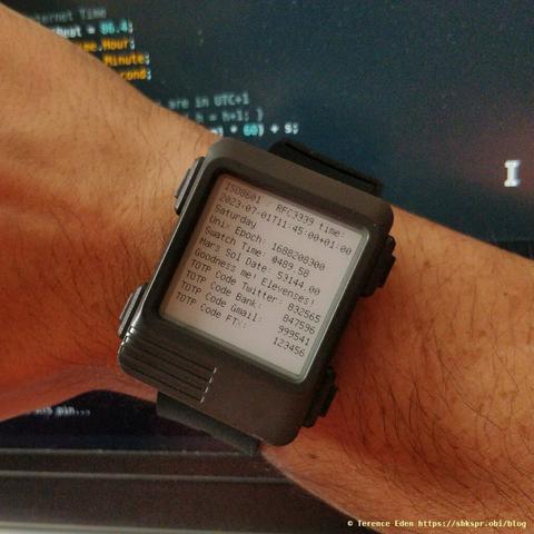 A chunky wristwatch showing the time and a selection of 6 digit codes and their corresponding entities.