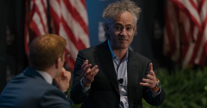 Alex Karp, a co-founder and the chief executive of Palantir, at a forum in Washington in April. The Trump administration has expanded Palantir’s work across the federal government.
