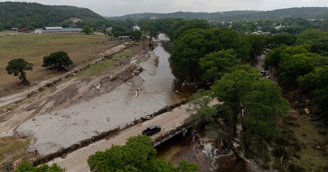 Damage from the flood around a bridge on Highway 39 in Hunt on July 5, 2025.