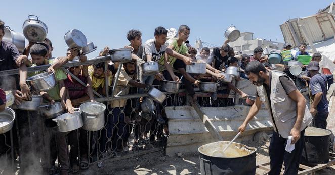 Gazans waited to receive meals at a charity kitchen this month. Nearly one in three people in the territory is not eating for days at a time, the United Nations said.